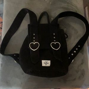 A cute medium black corduroy backpack by Valfre
